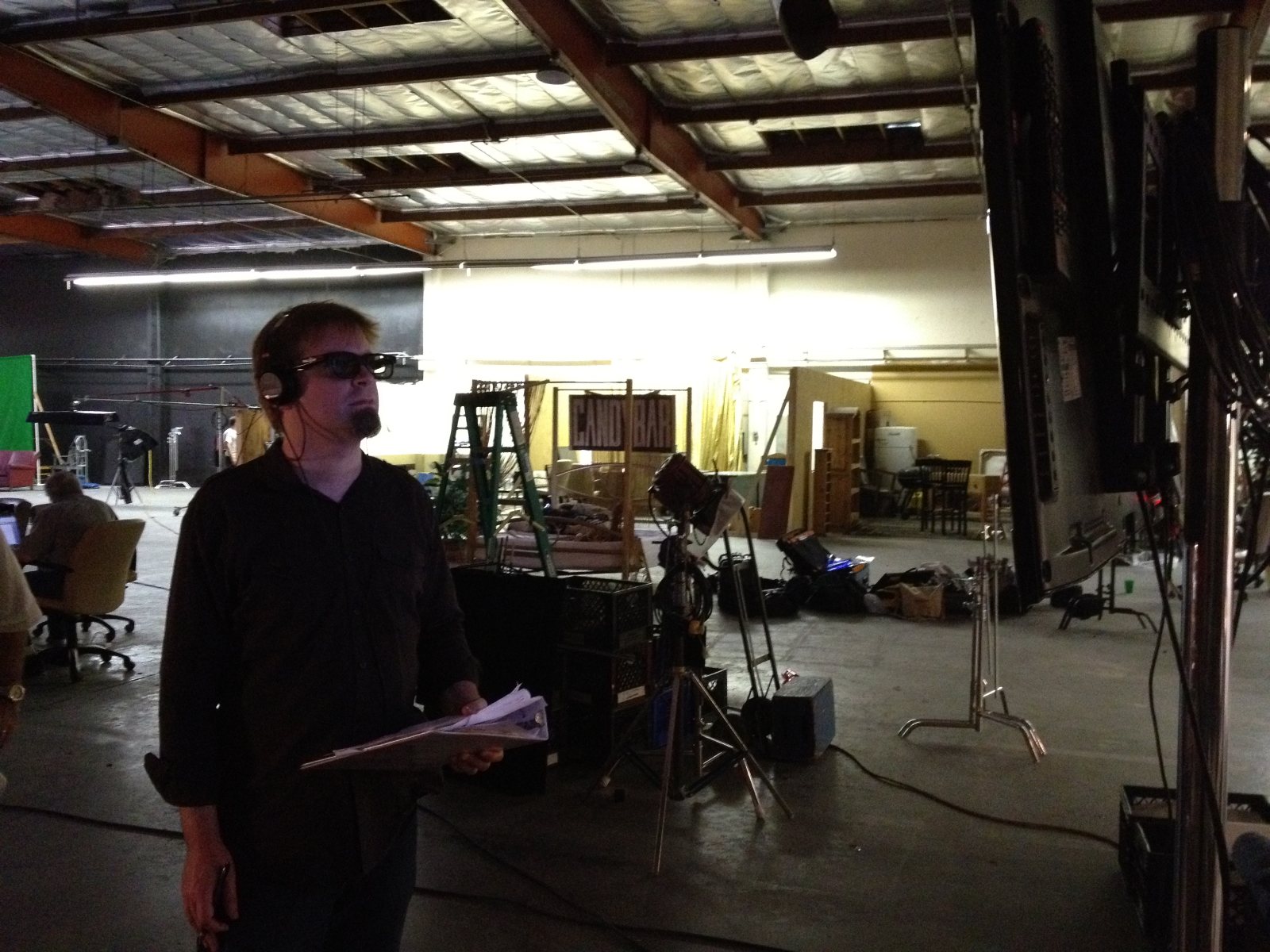 David Tarleton in 3D glasses on the Dark Secrets stage