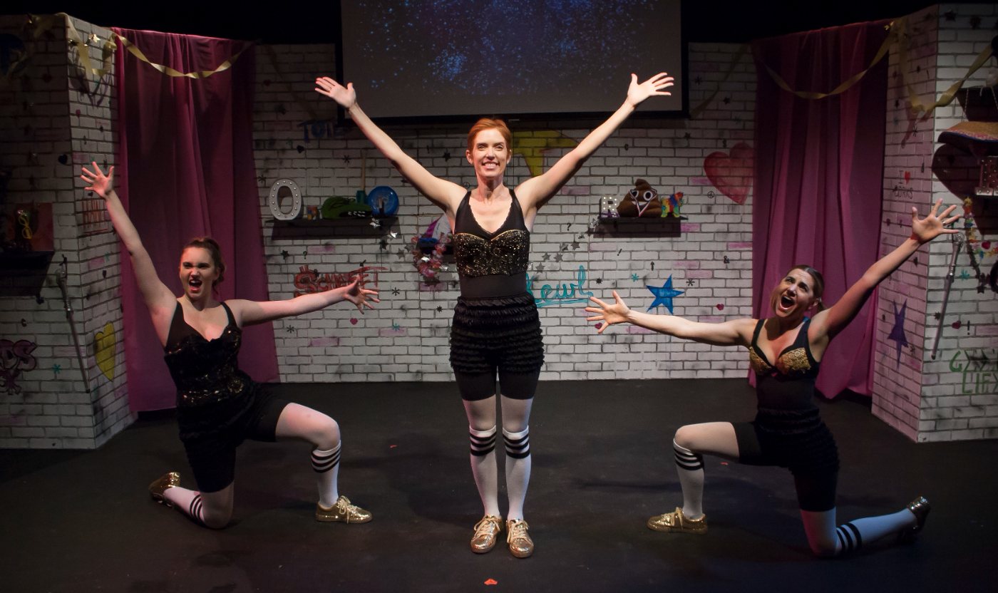 The cast of Dorkumentary Live! mid-number
