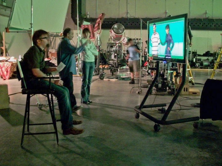 David Tarleton at the monitor on the greenscreen set
