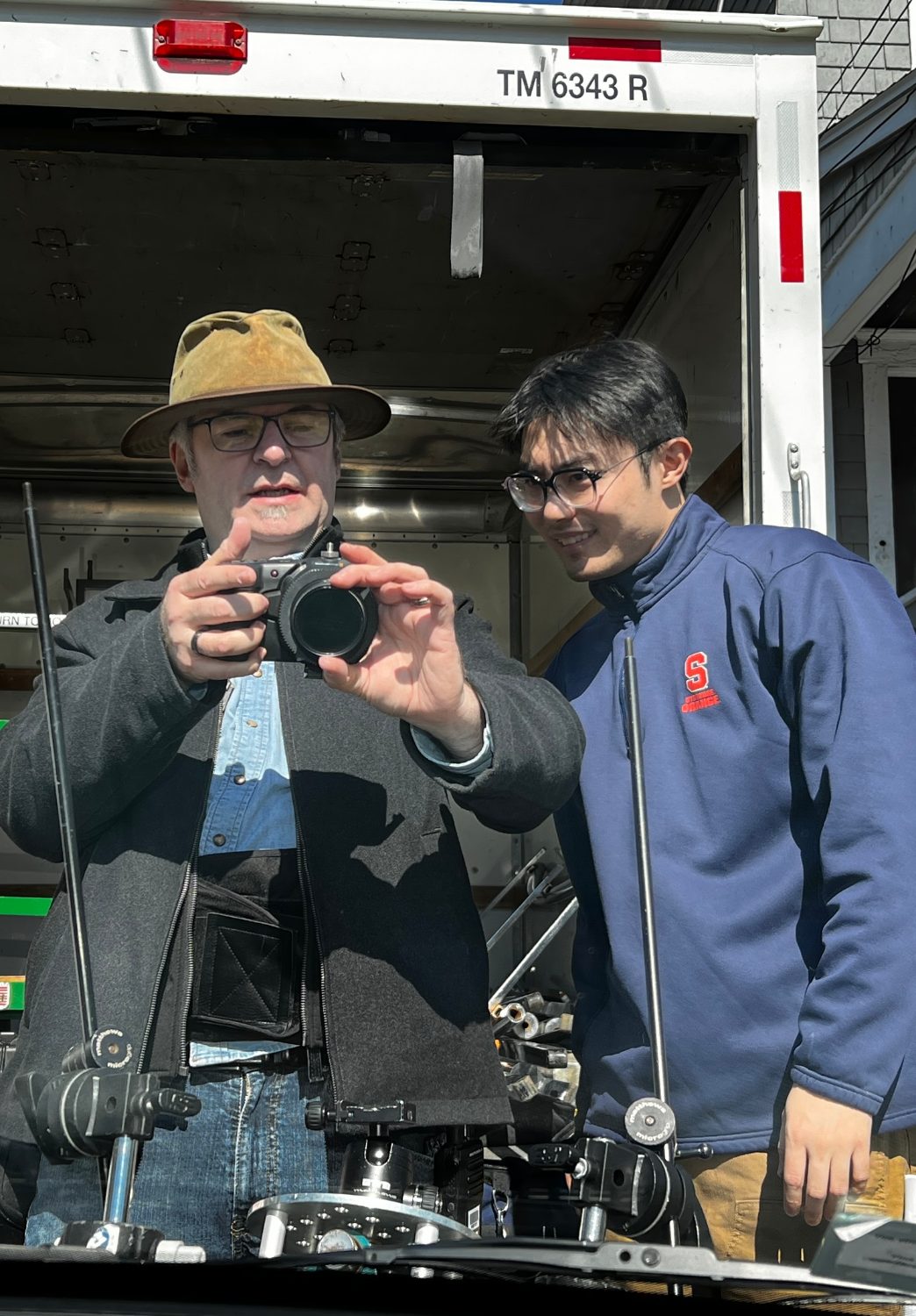 David Tarleton showing a student crew member the camera on Spiral